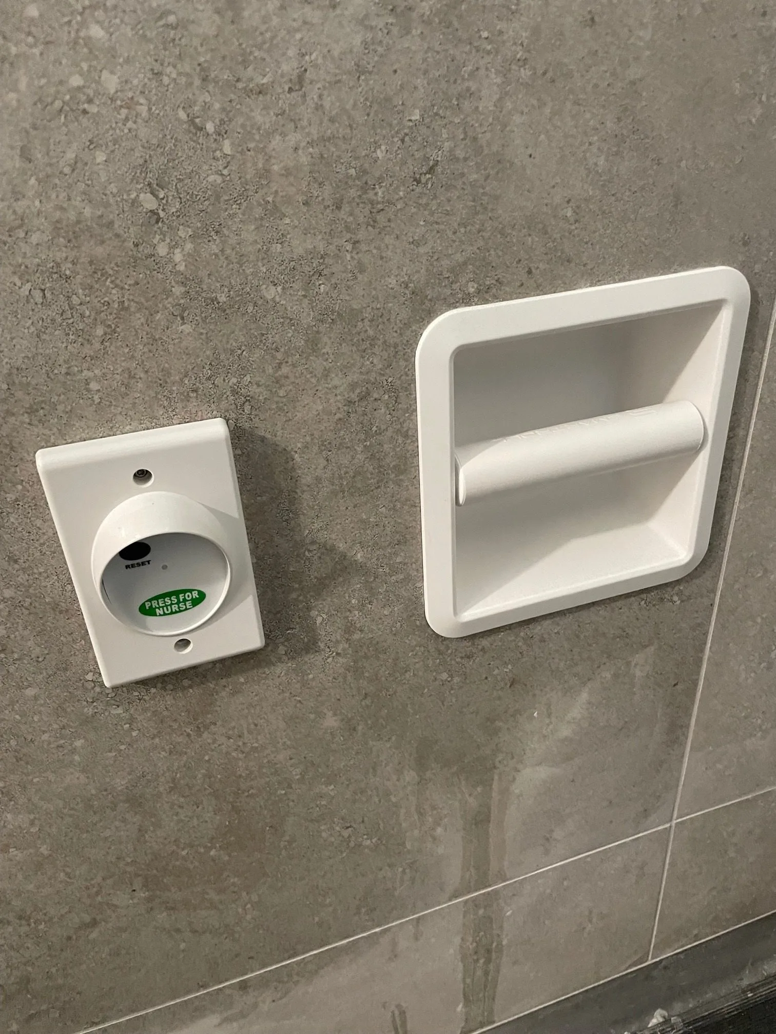 SmartRoll White installed in commercial bathroom