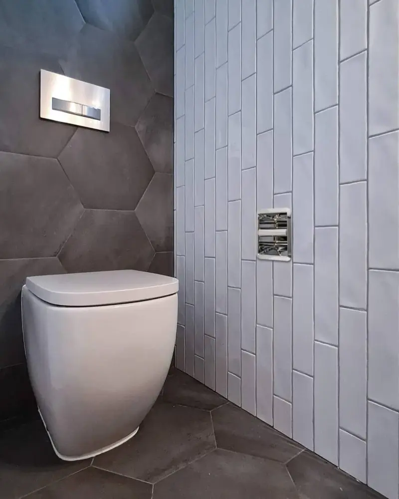SmartRoll installed in designer bathroom with hexagon tiles