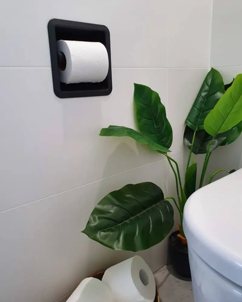 SmartRoll Matte Black installed in white bathroom