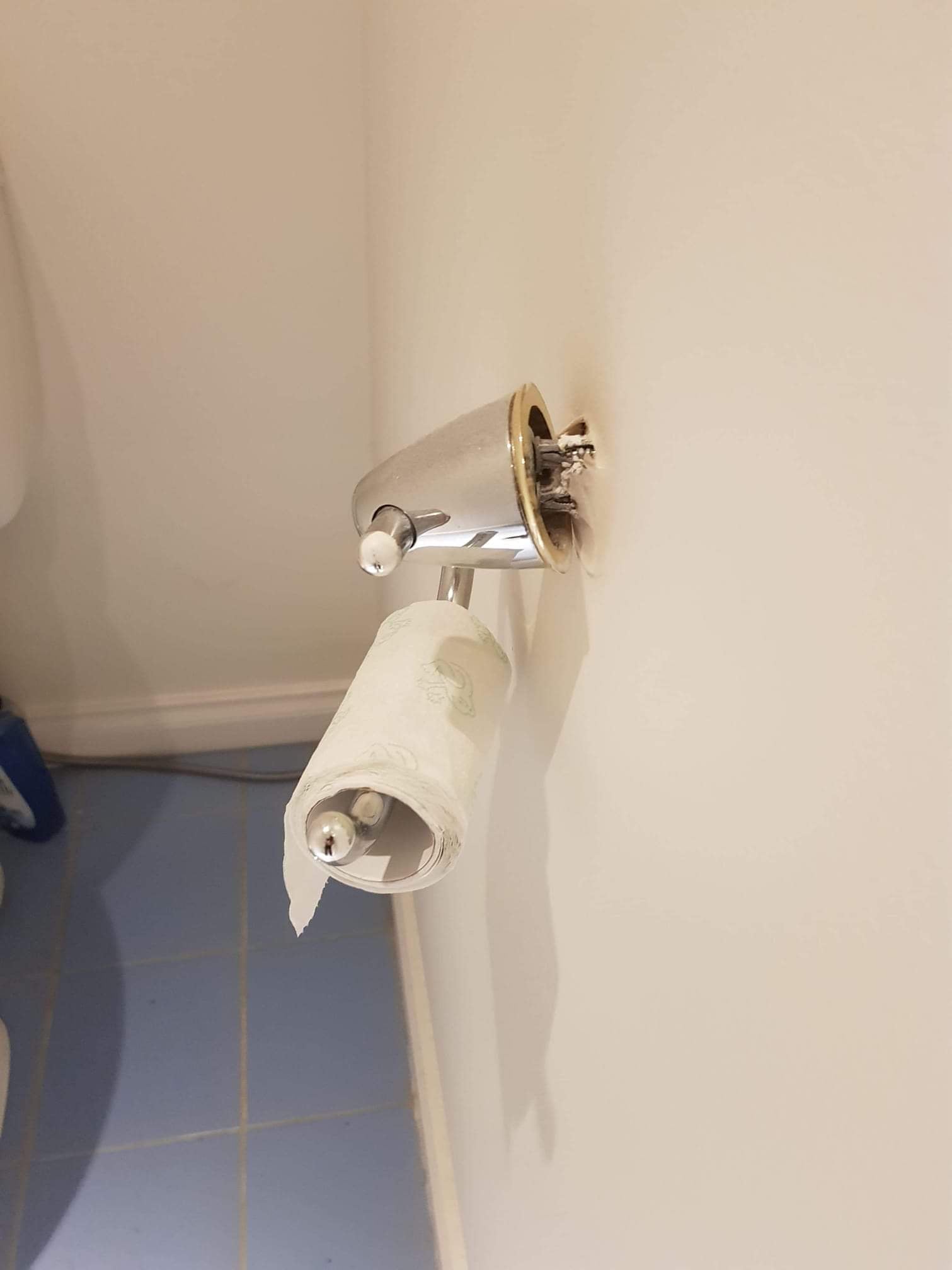 Before SmartRoll, old toilet roll holder